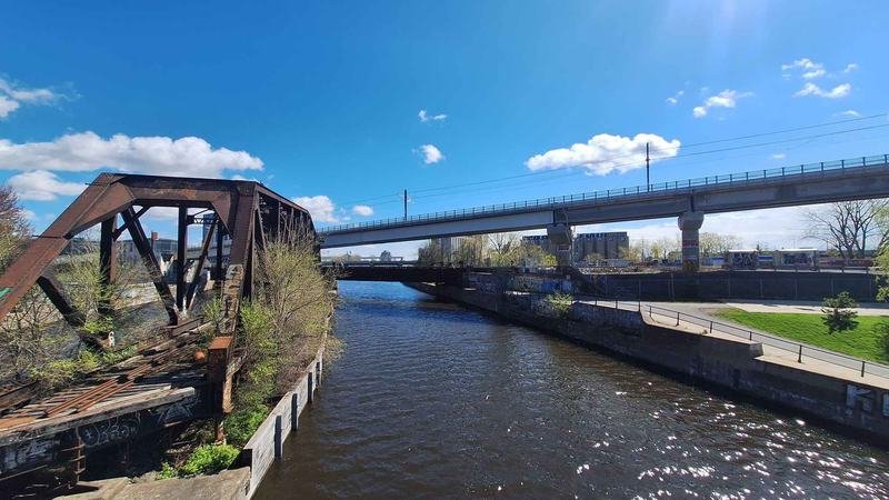 An old rusted rail bridge over the Lachine Canal